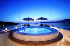 he%20Jacuzzi%20Pool%20By%20Night%20With%20Lighting.webp